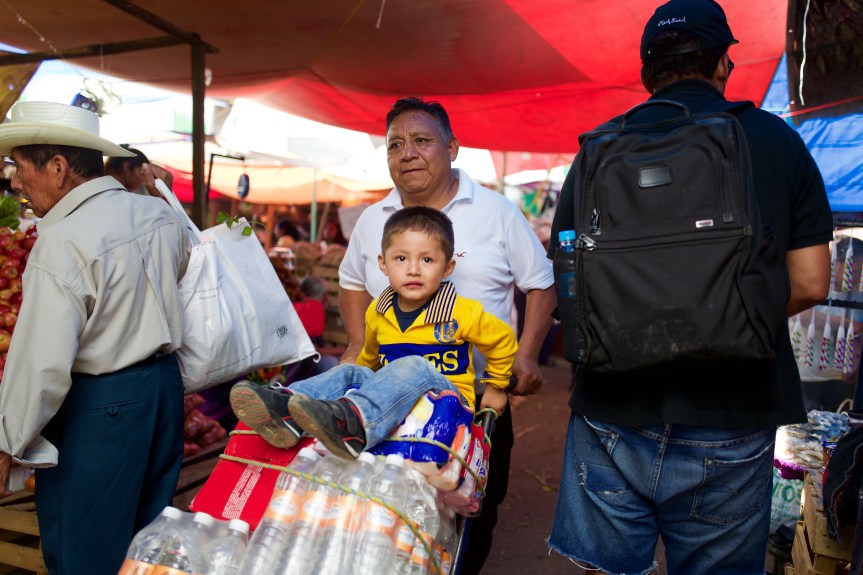 Moving the goods and the kid...