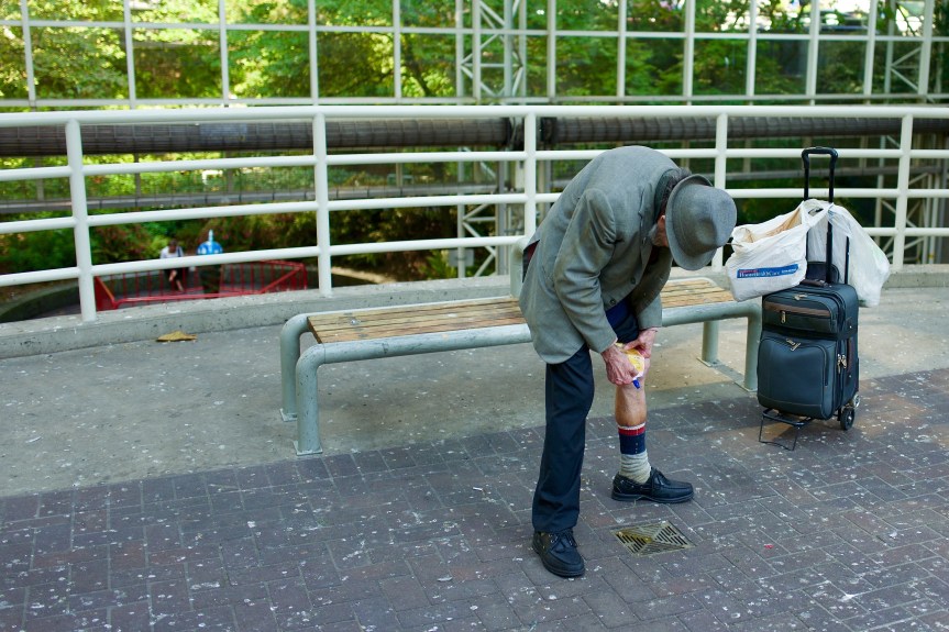 This poor guy has to empty his urine sack in a street drain because of a lack of public washrooms. Vancouver, BC.